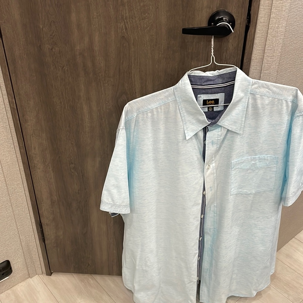 A light blue textured man’s shirt, 2 XL.